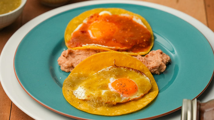 Huevos Divorciados with tomatillo and Arbol salsa